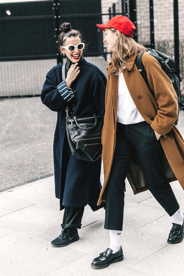 Fashion girls have totally mastered the art of the "dad" details. Tube socks, loafers, baseball hats, and oversize coats all fit the bill.