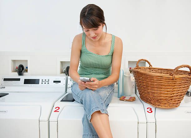 Woman in laundromat