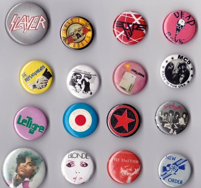 What's left of a once vast Rock n' Roll button collection. 32 pieces of flair.