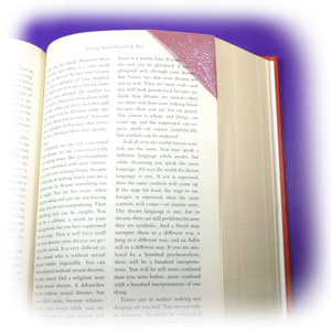 How to make an easy origami bookmark (http://www.origami-make.org/howto-origami-bookmark.php)