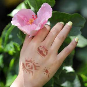Sun - small temporary tattoo henna designs Small henna tattoo designs are now available on easy to use sticker stencils. They stay in place to avoid mess and mistakes.