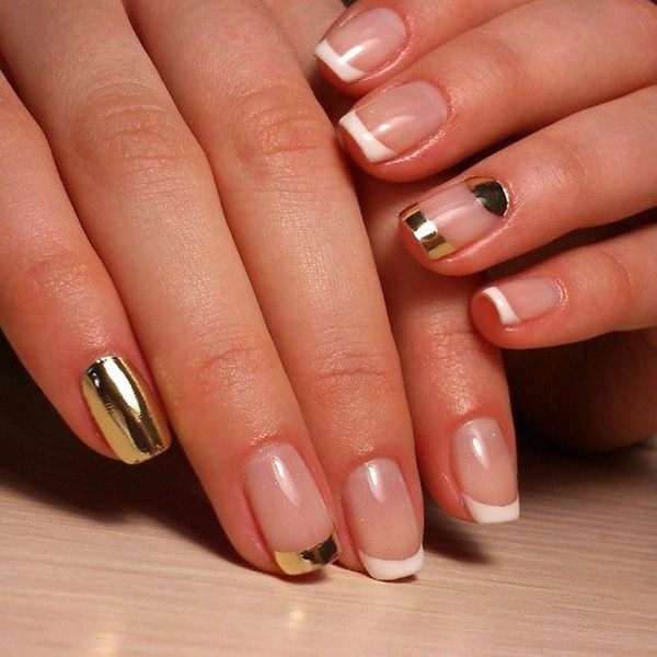 Glamorous looking French tips in clear, white and metallic polish.