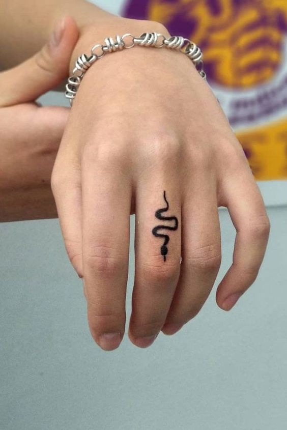 Finger Tattoos: Simple Yet Unique Designs At Your Fingertips