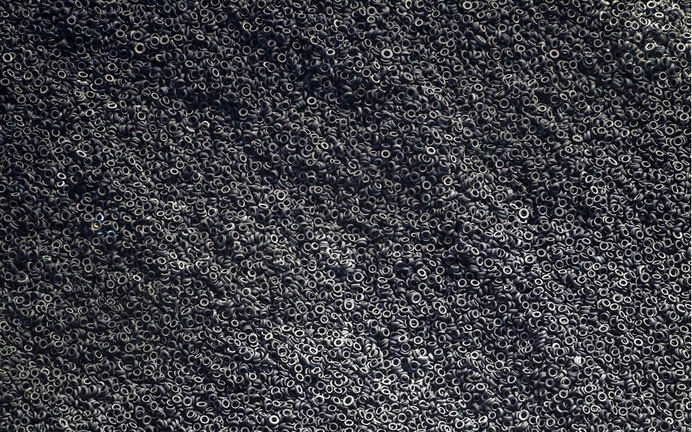 aerial-tire-scrapyard #rings #white #collection #black #pile #photography #industrial #and #metal
