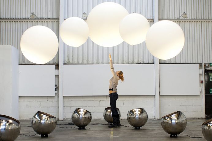 Interactive installation that lets you play with giant colourful orbs that levitate in mid-air | Creative Boom