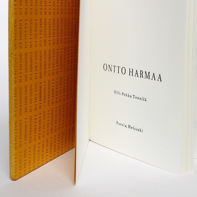 Sewn boards binding in fine goat skin by Kaija Rantakari, 2016. The binding features 768 binary code leather onlays and typed endpapers with
