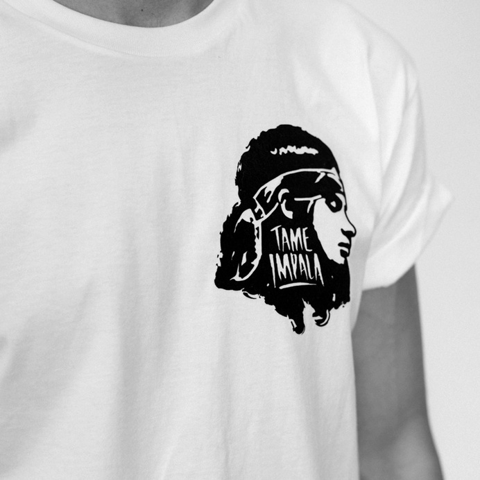 Tame Impala t-shirt featuring an illustration of Kevin Parker's head and a hand lettered logo. #breast #clothing #front #white #apparel #and #impala #design #black #left #t-shirt #tame