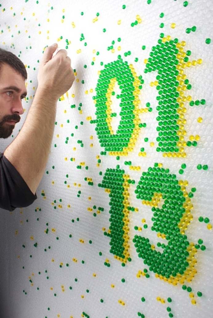 Ink-filled bubble wrap – Wired Magazine Lettering (Lettering) by Lo Siento Studio, Barcelona