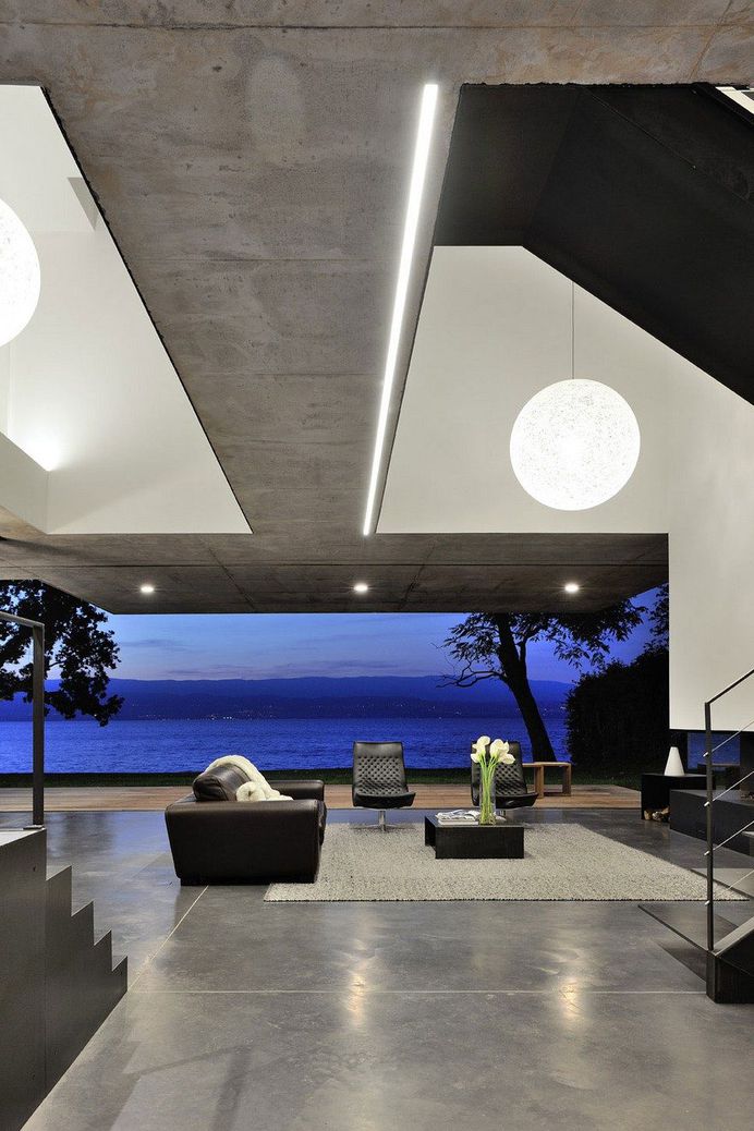 Contemporary Lake House Made Entirely of Raw Concrete 11