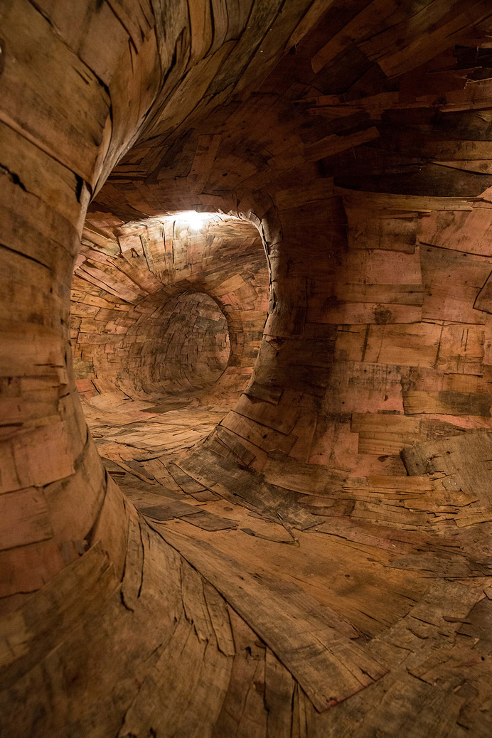 Henrique Oliveira Constructs a Cavernous Network of Repurposed Wood Tunnels at MAC USP #wood #installation