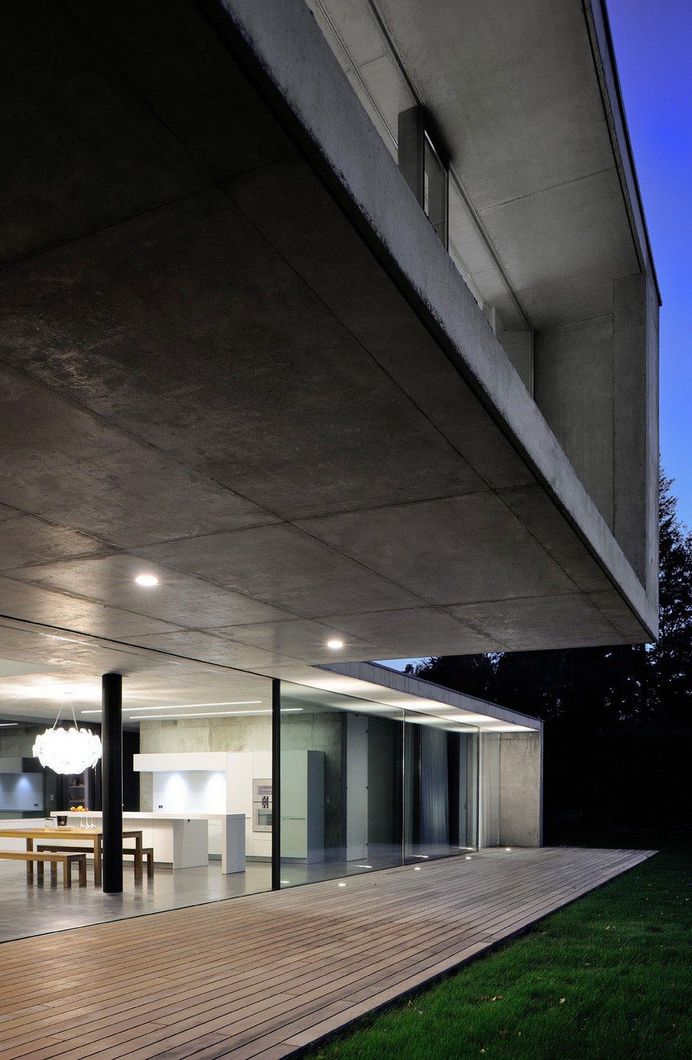 Contemporary Lake House Made Entirely of Raw Concrete 10