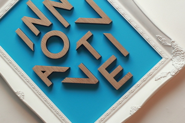 Leeds & Partners #frame #lettering #cut #laser #wood #passport #innovative #typography