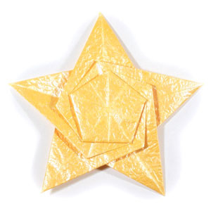 How to make a five-pointed seashell origami star (http://www.origami-make.org/howto-origami-star.php)