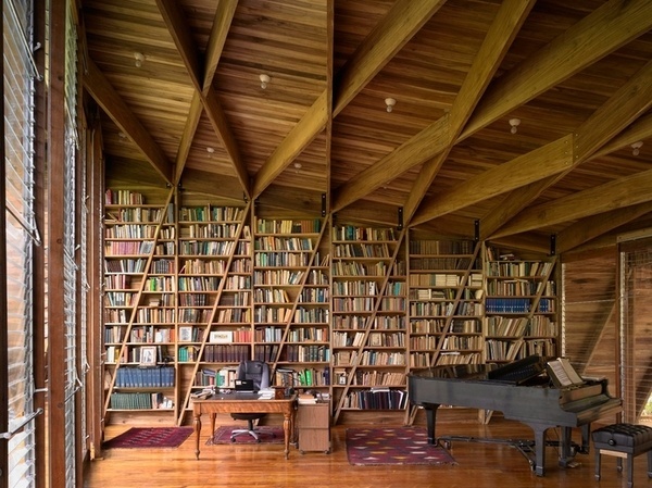 Library shelving and structure as one #wood #architecture