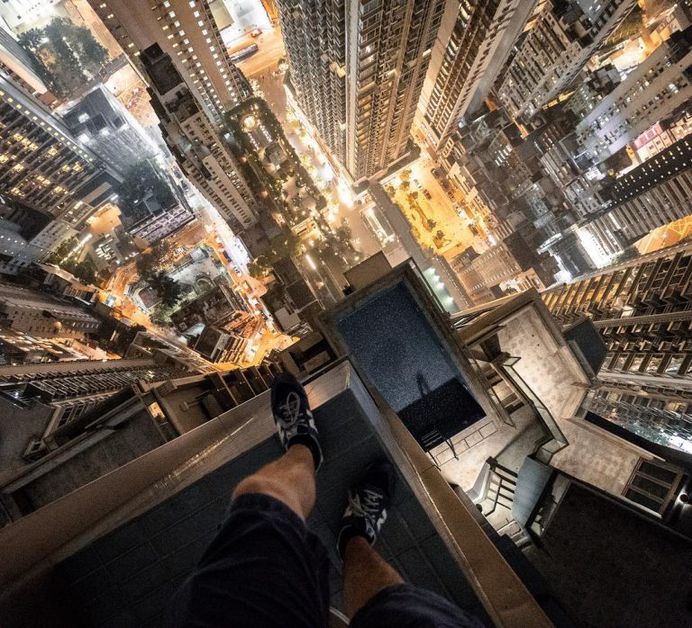 Daredevil Building Climber: Roooftop Photography by Andrej Ciesielski