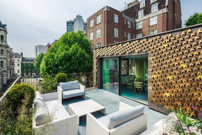 House With a Bronze Leaf Facade