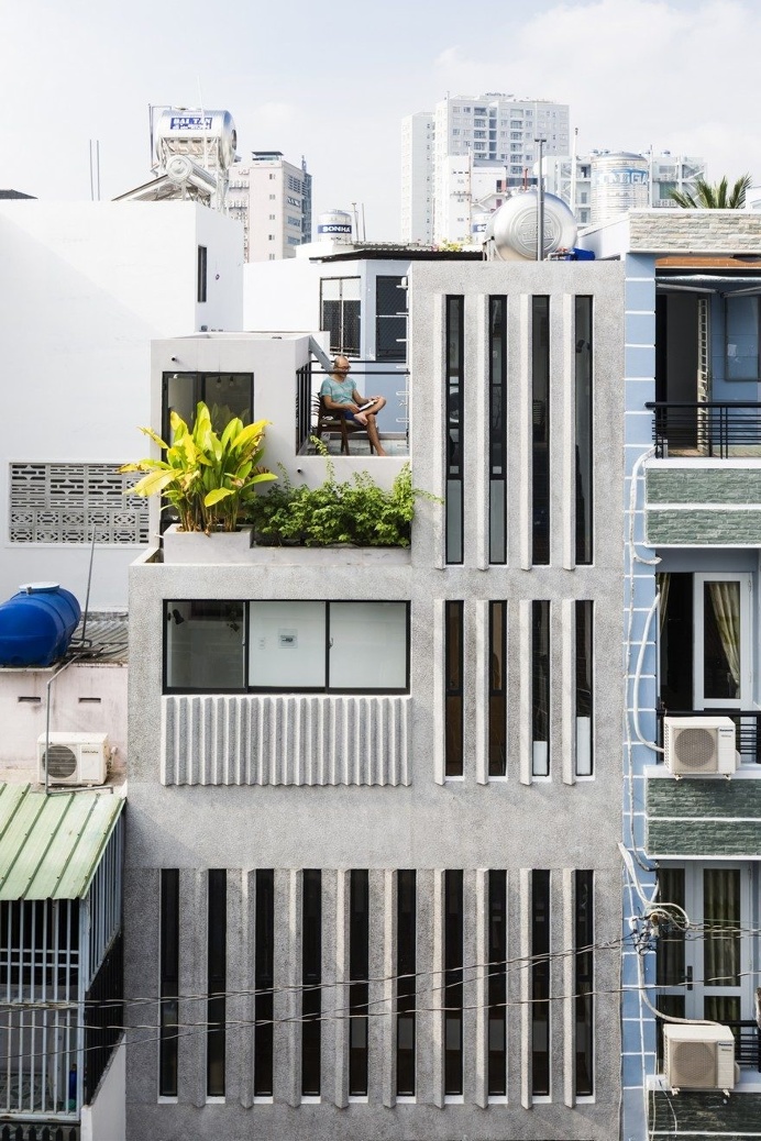 Narrow Vertical Home Maximizes Light and Space in Ho Chi Minh City, Vietnam
