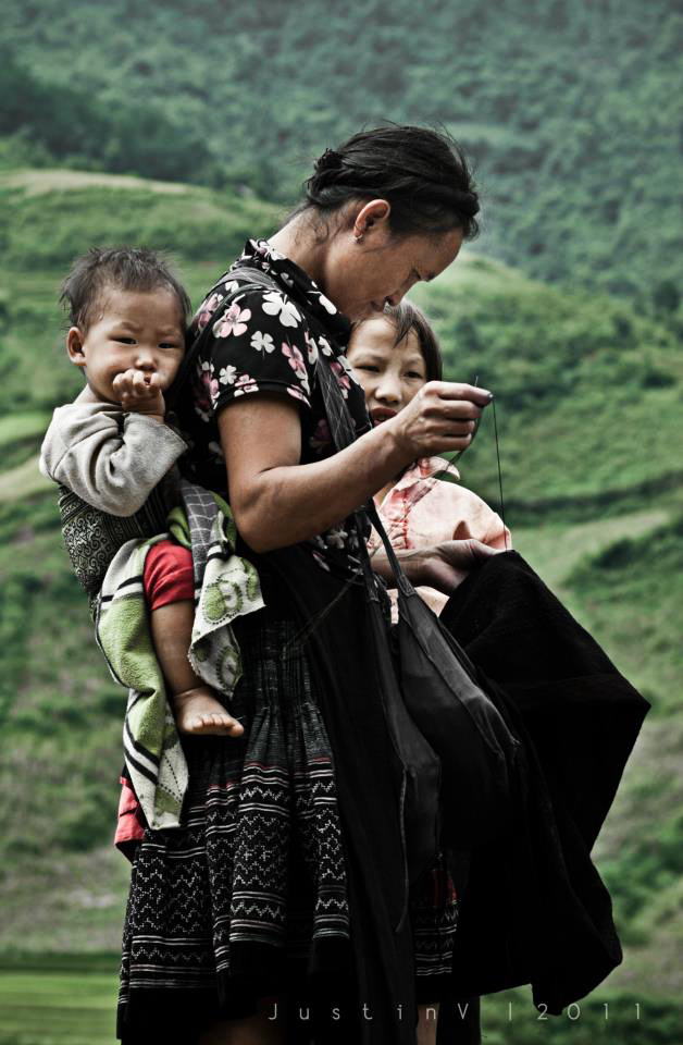 A tribe women sewing for her child - taken in the North of Vietnam #vietnam #family #woman #tribe #asia #child #culture #care #photography #mother #beauty