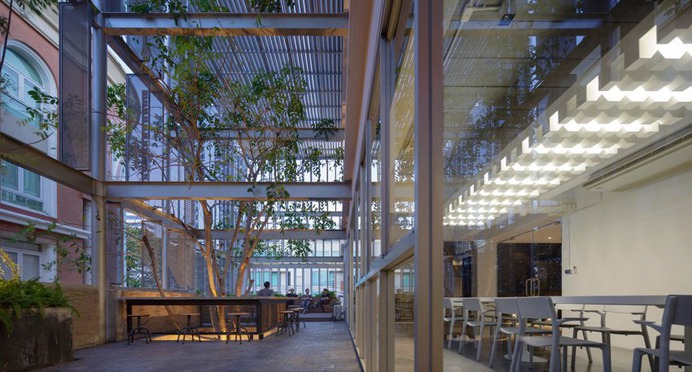 SO architects installs metal shell on DP group's newly redesigned headquarters in thailand