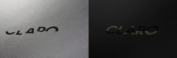 Claro. Logotype, playing with special inks and light #modular #interactive #phospho #serif #print #sans #logo #light #grey