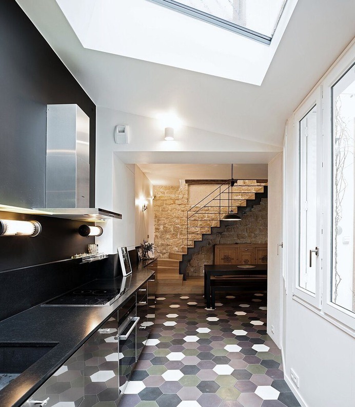 Small Unhealthy Building Converted into a Family Home