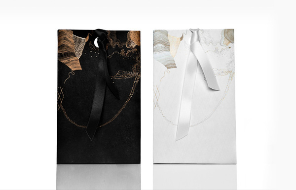 Ribbon tied packaging with gold foil detail designed by Anagrama for San Pedro pastry shop Catalina Fernandez #tied #anagrama #catalina #packaging #designed #shop #san #gold #ribbon #fernandez #pastry #detail #foil #pedro