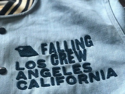 Embrodery on front.