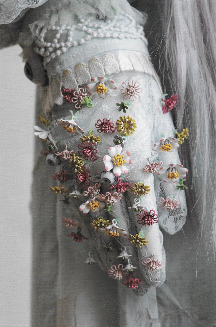 archive-pdf: "Close-up details of Undercover's SS05 'But Beautiful II' runway piece. [ SOURCE & FULL SCAN : 'Undercover: 25 Year Retrospective' ] "