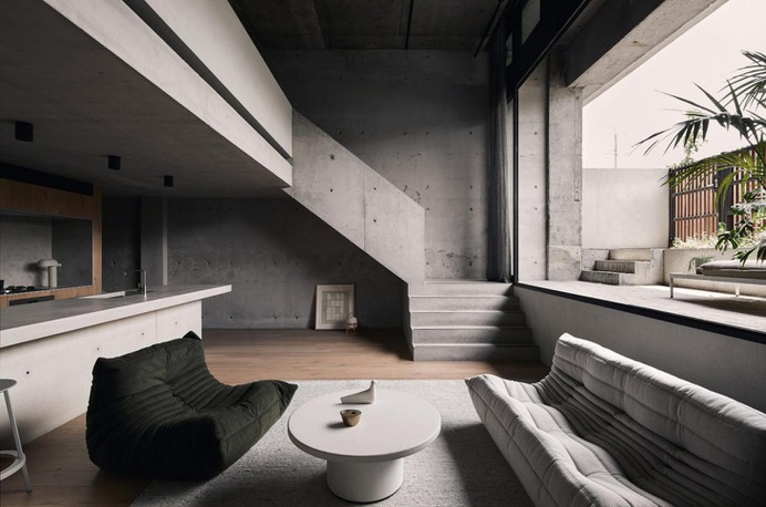 A concrete interior inside a Melbourne apartment. Clifton Hill apartment, Studio Goss, Melbourne.