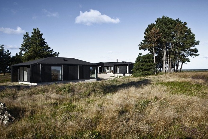 Modern Wooden House with Clean Lines and a Transparent Design