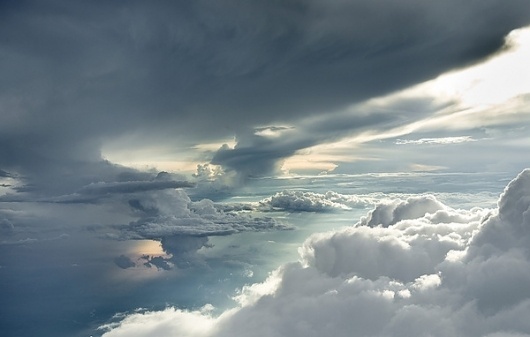 Clouds photographed 4 miles up through open airplane doors | Colossal #clouds #photography #cloud #sky