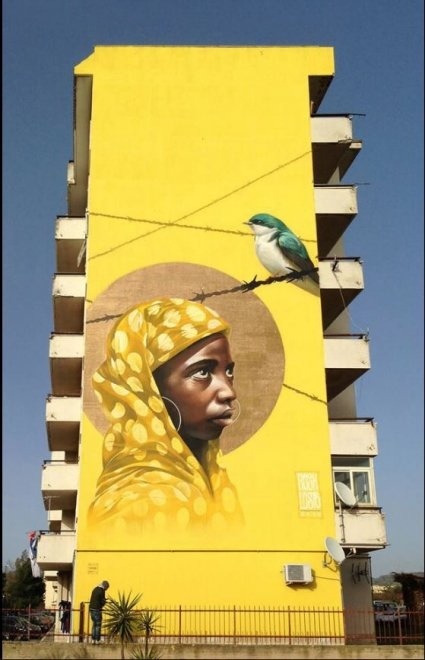 Walls for migrants, street artists tell the drama