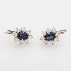 Earrings with oval faceted sapphires