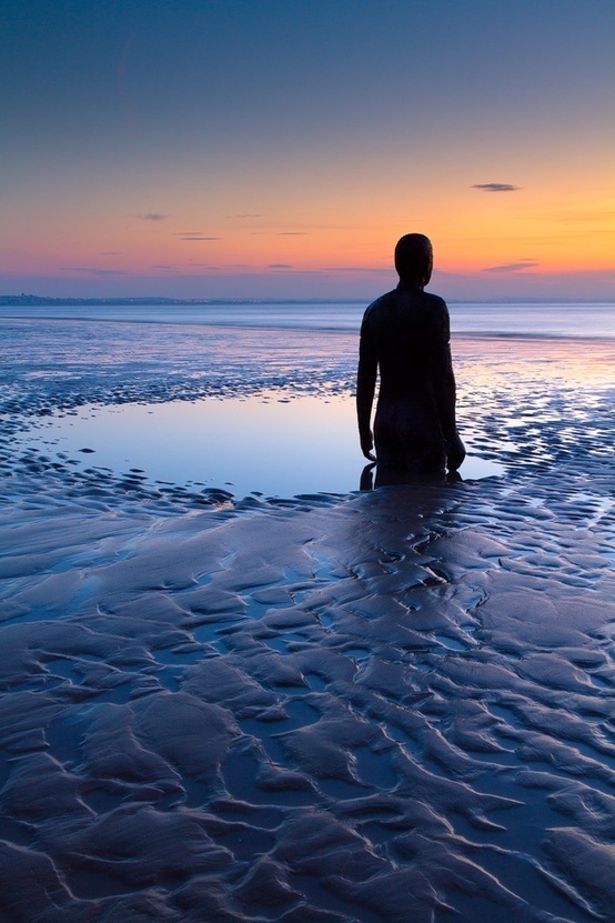 Photographs of Antony Gormley's 'Another Place' by Paul Sutton | Imaginary Foundation #sun #water #photography #colors #silhouette #rise #beach