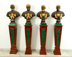 Four bronze busts of Roman emperors