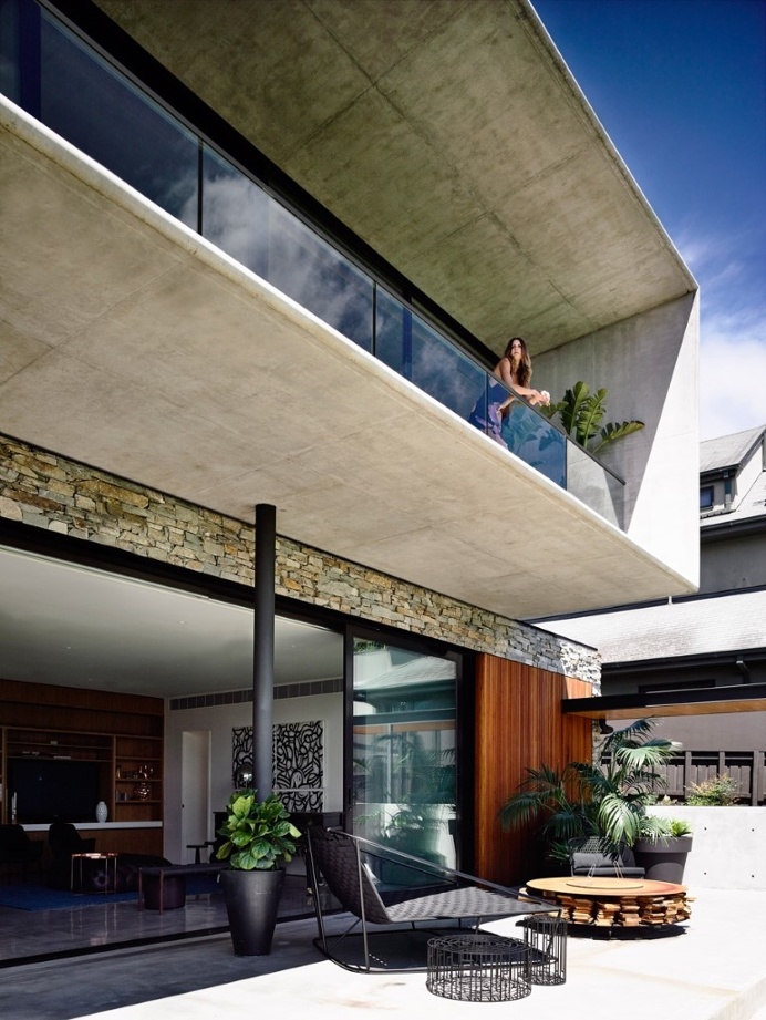 Concrete House Provide Strong Visual Connections Between Levels