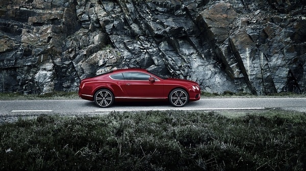 A GT that drives to a different beat. #red #bentley #motors #ride #car
