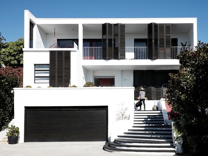 Inside Outside House – Private Retreat With a Louvered Facade