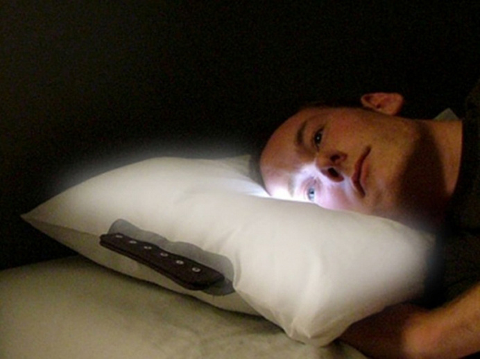 Wake up gradually and gently with the Glow Pillow's rising built-in light that mimics a natural sunrise. #modern #design #home #product #industrial