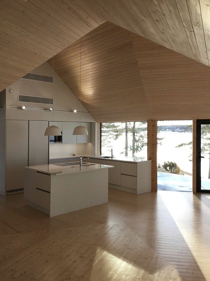 This Modern Finnish House Consists of Three Barns Put Together in a Y Shape 10