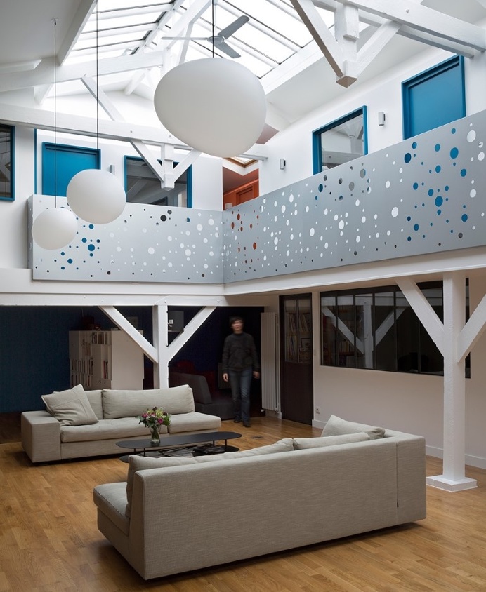 Old Carpentry Transformed into a Light-Filled Loft