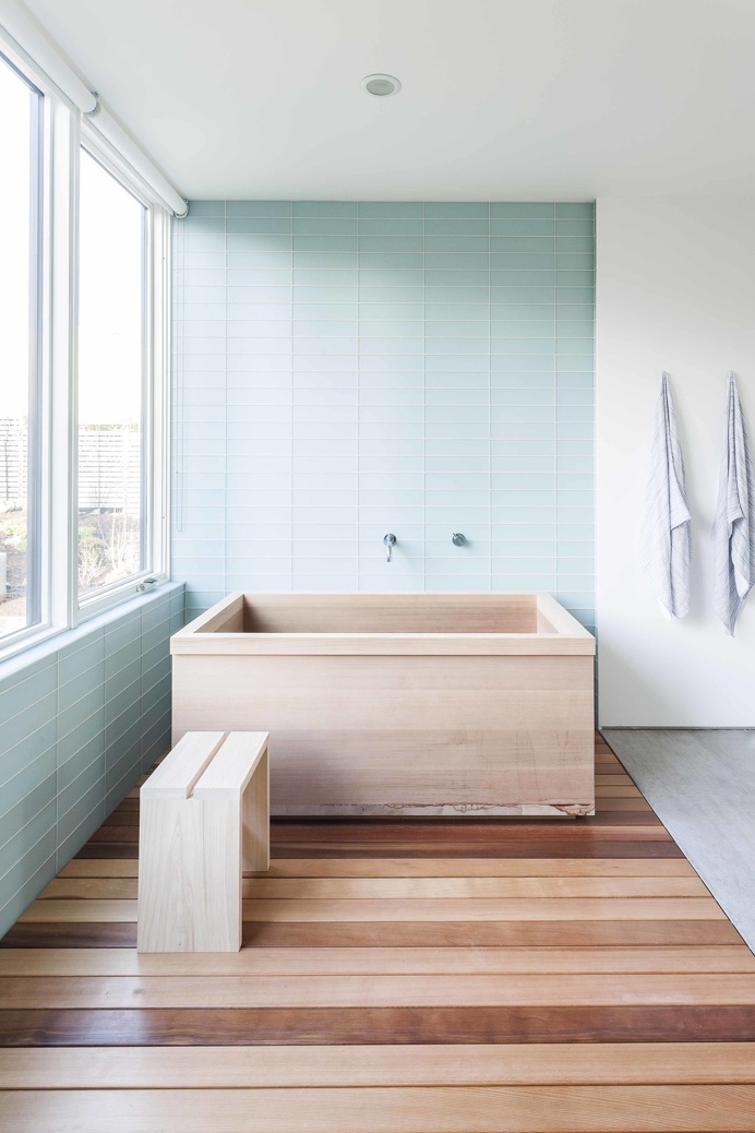 The custom cedar tub, fabricated by Dovetail, elegantly fits into this master bathroom.