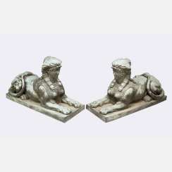 A pair of large bronze sphinxes in Egyptomanian style