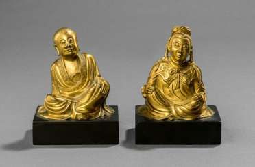 Pair of fire gilt bronze of a Lohan and a female seated lady