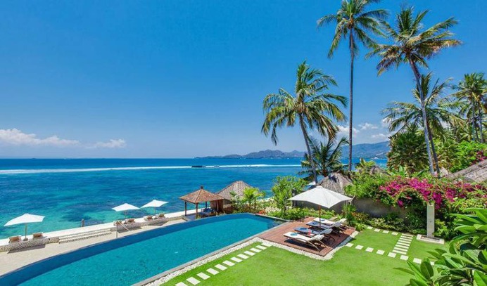This exclusive 4 bedroom Welcome to Villa 3330, a stunning new Luxury Beach House located right on the water in the Candidasa area of Bali's picturesque and unspoiled East coast.