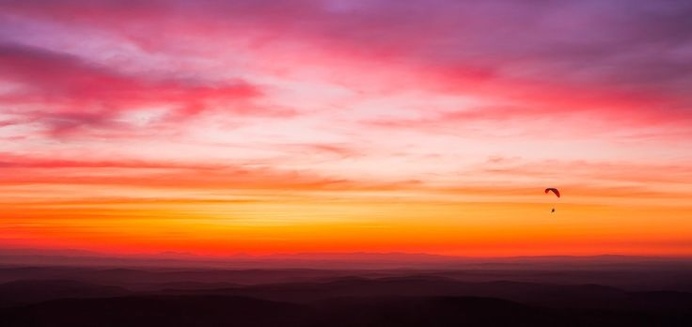 Paraglider enjoying this amazing sunrise! Location: Cluj-Napoca, Romania Photo by: www.mateiplesa.com #paraglider #paragliding #sunrise #