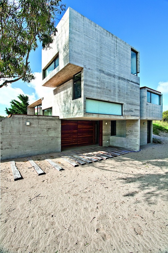 Concrete Beach House With Industrial Features