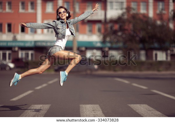 Beautiful dancing girl on a street