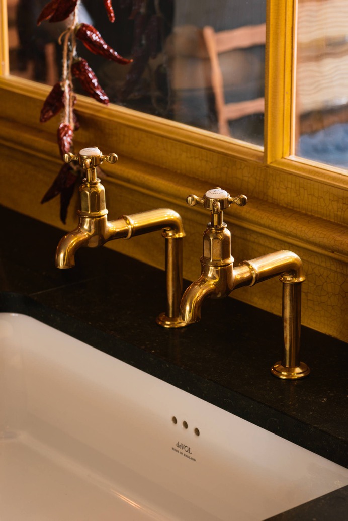 The partition was treated with a unique crackle glaze to give it a beautifully aged appearance.