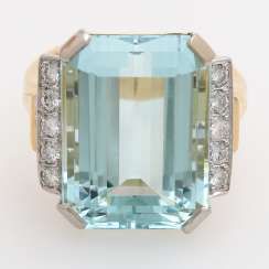 Ladies ring with aquamarine and diamonds.